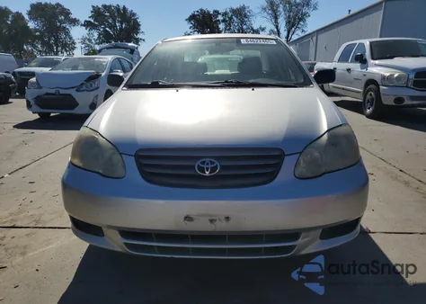 2003 Toyota Corolla Ce z USA, uszkodzony, nr VIN JTDBR32EX32008818